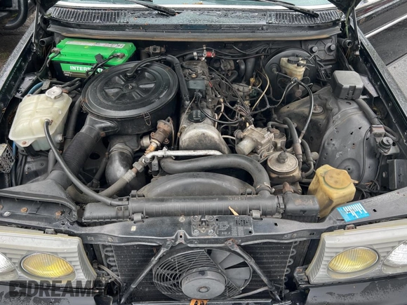 1984 Mercedes-Benz 300 with VIN WDBAB53A5EA022012, listed as a Copart auction lot 56141945 with 114,089 mi miles and Clean Title. Bid and sale history available at DreamBid. Image 7.