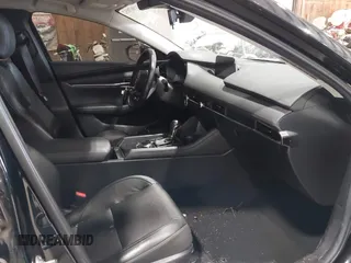2020 Mazda 3 Premium with VIN 3MZBPBEM4LM123018, listed as a IAAI auction lot 41967652 with 84,642 mi miles and . Bid and sale history available at DreamBid. Image 5.