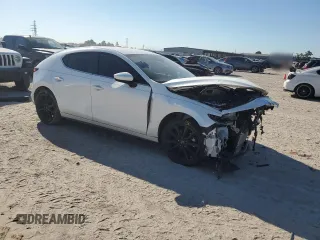 2019 Mazda Mazda3 Hatchback w/Preferred Pkg with VIN JM1BPBMM7K1125524, listed as a Copart auction lot 73327114 with 13,959 mi miles and Salvage Title. Bid and sale history available at carsss.com. Image 4.