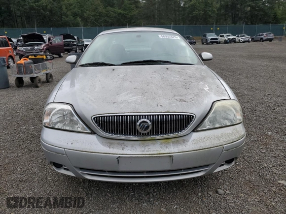 2004 Mercury Sable GS z VIN 1MEFM50U34G601378, wystawiony jako Copart lot #56952825 z przebiegiem 63 456 mil mil oraz Tytuł czysty. Historia ofert i sprzedaży dostępna na DreamBid. Obrazek 5.