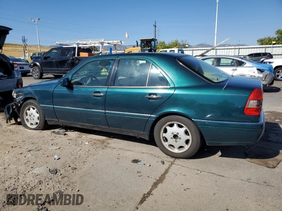 1997 Mercedes-Benz C with VIN WDBHA23EXVF507185, listed as a Copart auction lot 73716364 with 167,171 mi miles and Salvage title. Bid and sale history available at DreamBid. Image 2.