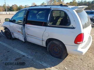 1999 Dodge Caravan SE with VIN 2B4GP45G0XR312100, listed as a IAAI auction lot 40966771 with 233,188 mi miles and . Bid and sale history available at carsss.com. Image 3.