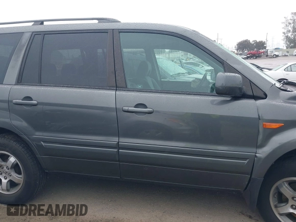 2007 Honda Pilot EX with VIN 2HKYF18497H500458, listed as a IAAI auction lot 41784273 with 114,454 mi miles. Bid and sale history available at carsss.com. Image 13.