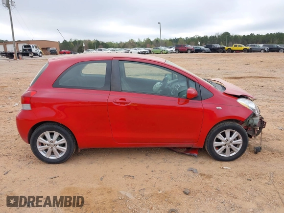 2009 Toyota Yaris with VIN JTDJT903595243068, listed as a IAAI auction lot 41899358 with 310,199 mi miles. Bid and sale history available at carsss.com. Image 13.