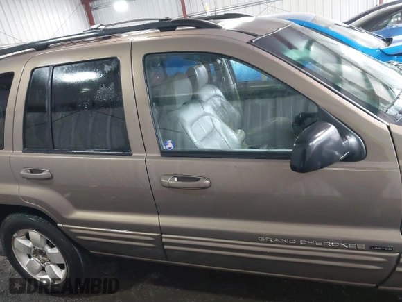 2001 Jeep Grand Cherokee Limited with VIN 1J4GW58N51C581743, listed as a IAAI auction lot 41768215 with 195,862 mi miles. Bid and sale history available at carsss.com. Image 13.