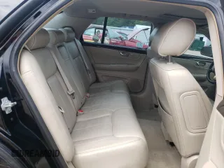 2011 Cadillac DTS Luxury Collection z VIN 1G6KD5E62BU112658, wystawiony jako Copart lot #56920935 z przebiegiem 141 550 mil mil oraz Tytuł czysty. Historia ofert i sprzedaży dostępna na DreamBid. Obrazek 10.