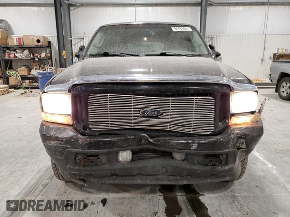 2003 Ford Excursion Limited z VIN 1FMNU43S43EA49493, wystawiony jako Copart lot #84454084 z przebiegiem 280 429 mil mil oraz Szkoda całkowita • Salvage title. Historia ofert i sprzedaży dostępna na DreamBid. Obrazek 5.