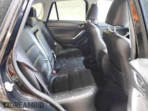 2016 Mazda CX-5 Grand Touring with VIN JM3KE4DY3G0859067, listed as a Copart auction lot 49759775 with 92,928 mi miles and Salvage Title. Bid and sale history available at carsss.com. Image 11.