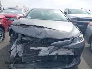 2019 Toyota Camry LE with VIN 4T1B11HK4KU254853, listed as a IAAI auction lot 42013255 with 153,664 mi miles and . Bid and sale history available at DreamBid. Image 12.