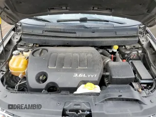 2012 Dodge Journey SXT z VIN 3C4PDCBG3CT213515, wystawiony jako Copart lot #58128845 z przebiegiem 208 152 mil mil oraz Szkoda całkowita • Salvage title. Historia ofert i sprzedaży dostępna na DreamBid. Obrazek 11.
