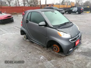 2014 Smart fortwo Pure with VIN WMEEJ3BAXEK783075, listed as a IAAI auction lot 41505299 with 34,473 mi miles and . Bid and sale history available at DreamBid. Image 1.