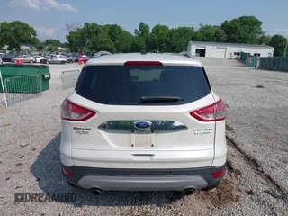 2015 Ford Escape Titanium with VIN 1FMCU0JXXFUA07175, listed as a IAAI auction lot 42447067 with 94,893 mi miles and . Bid and sale history available at DreamBid. Image 16.