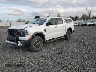 2024 Ford Ranger XLT with VIN 1FTER4HH5RLE15159, listed as a Copart auction lot 46310435 with 1,858 mi miles and Salvage Title. Bid and sale history available at carsss.com. Image 1.