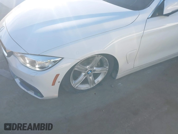 2016 BMW 4 Series 428i xDrive with VIN WBA4C9C54GG139275, listed as a IAAI auction lot 40828786 with 128,124 mi miles and . Bid and sale history available at carsss.com. Image 6.