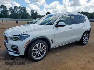 2019 BMW X5 xDrive40i with VIN 5UXCR6C51KLL05987, listed as a Copart auction lot 62509375 with 60,740 mi miles and Salvage title. Bid and sale history available at DreamBid. Image 1.