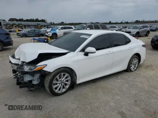 2023 Toyota Camry LE z VIN 4T1C11AK7PU174680, wystawiony jako Copart lot #50142545 z przebiegiem 75 237 mil mil oraz Szkoda całkowita • Salvage title. Historia ofert i sprzedaży dostępna na DreamBid. Obrazek 1.