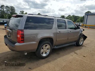 2013 Chevrolet Suburban LS z VIN 1GNSCHE00DR221307, wystawiony jako Copart lot #54684925 z przebiegiem 203 169 mil mil oraz Szkoda całkowita • Salvage title. Historia ofert i sprzedaży dostępna na DreamBid. Obrazek 3.