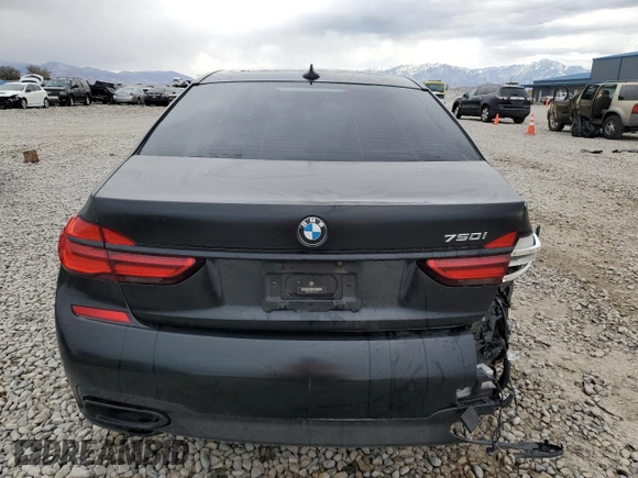 2018 BMW 7 Series 750i with VIN WBA7F0C55JGM23537, listed as a Copart auction lot 76824074 with 64,682 mi miles and Salvage Title. Bid and sale history available at carsss.com. Image 6.