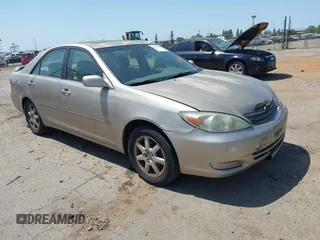 2002 Toyota Camry XLE z VIN JTDBF30K120030783, wystawiony jako IAAI lot #42442426 z przebiegiem 201 656 mil mil oraz . Historia ofert i sprzedaży dostępna na DreamBid. Obrazek 1.
