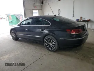 2015 Volkswagen CC Executive z VIN WVWGU7AN6FE809276, wystawiony jako Copart lot #54836135 z przebiegiem 134 565 mil mil oraz Tytuł czysty. Historia ofert i sprzedaży dostępna na DreamBid. Obrazek 2.