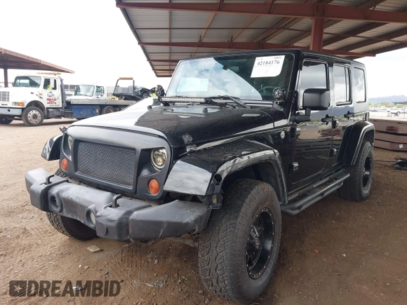 2008 Jeep Wrangler Unlimited Sahara with VIN 1J8GA59128L542384, listed as a IAAI auction lot 42184176 with 152,768 mi miles and . Bid and sale history available at DreamBid. Image 2.