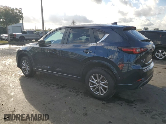 2024 Mazda CX-5 2.5 S Carbon Edition with VIN JM3KFBCL0R0458750, listed as a Copart auction lot 45976215 with 5,194 mi miles and Salvage Title. Bid and sale history available at carsss.com. Image 2.