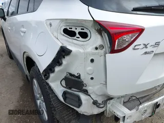 2015 Mazda CX-5 Touring with VIN JM3KE4CY4F0488484, listed as a IAAI auction lot 42115093 with 156,344 mi miles. Bid and sale history available at carsss.com. Image 20.