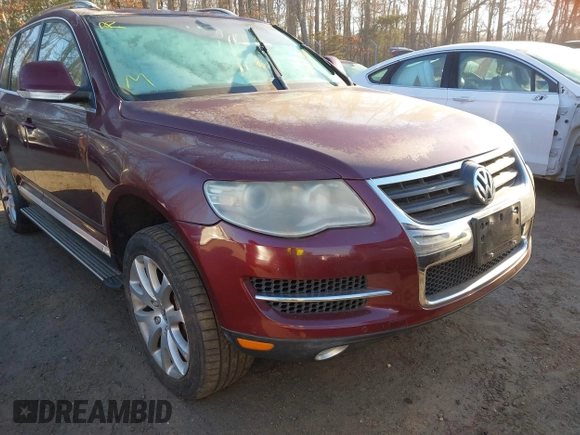 2008 Volkswagen Touareg V6 z VIN WVGBE77L38D044092, wystawiony jako IAAI lot #41766743 z przebiegiem Nie podano mil oraz . Historia ofert i sprzedaży dostępna na DreamBid. Obrazek 6.