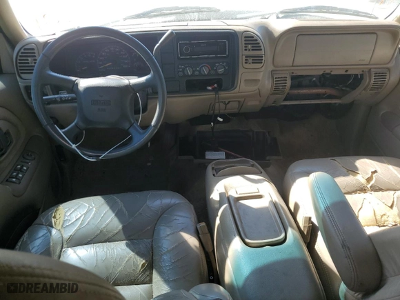 1999 GMC Suburban with VIN 3GKEC16R7XG542862, listed as a Copart auction lot 77568734 with 251,717 mi miles and Salvage Title. Bid and sale history available at carsss.com. Image 8.