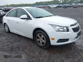 2014 Chevrolet Cruze 1LT с VIN 1G1PC5SB6E7233051, выставлен на аукционе IAAI как лот 42214334 с пробегом 88 389 миль миль и . История ставок и продаж доступна на DreamBid. Изображение 1.
