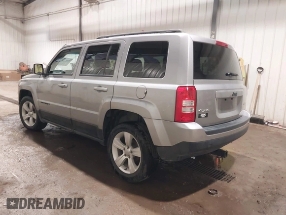 2016 Jeep Patriot Latitude with VIN 1C4NJRFB0GD581213, listed as a IAAI auction lot 42407888 with 104,202 mi miles and . Bid and sale history available at DreamBid. Image 3.