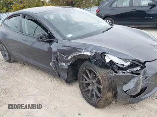 2023 Tesla Model 3 z VIN 5YJ3E1EA3PF699724, wystawiony jako IAAI lot #40654814 z przebiegiem Nie podano mil oraz . Historia ofert i sprzedaży dostępna na DreamBid. Obrazek 6.