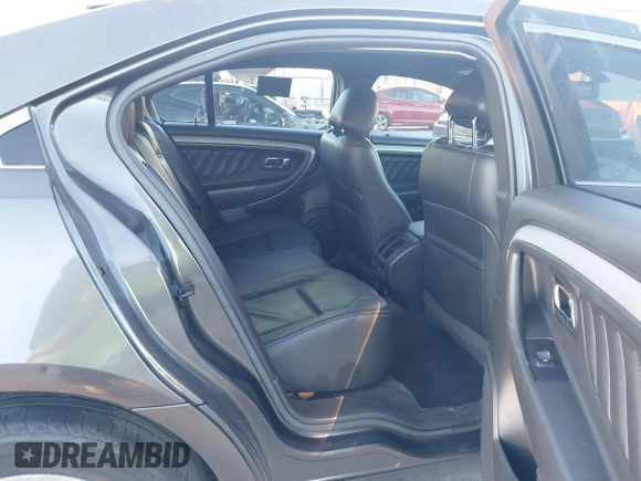 2017 Ford Taurus SEL z VIN 1FAHP2E80HG129843, wystawiony jako IAAI lot #41252910 z przebiegiem 111 923 mil mil oraz . Historia ofert i sprzedaży dostępna na DreamBid. Obrazek 8.