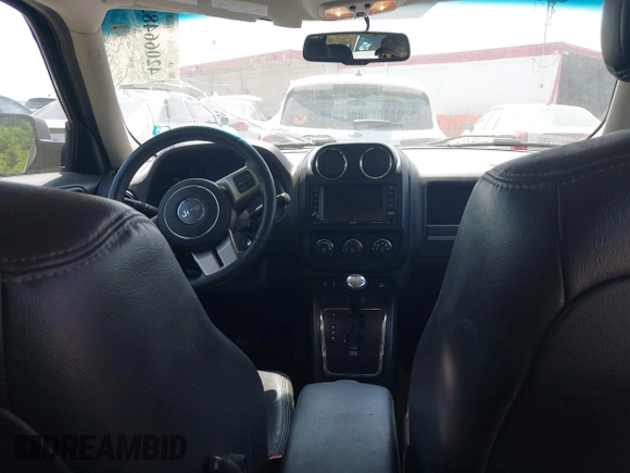 2016 Jeep Patriot Latitude with VIN 1C4NJRFB7GD658594, listed as a IAAI auction lot 42066483 with 146,492 mi miles. Bid and sale history available at carsss.com. Image 17.