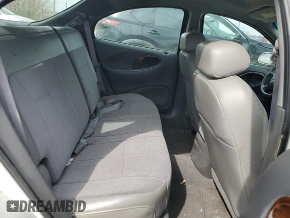 1999 Mercury Sable z VIN 1MEFM58U7XA652331, wystawiony jako Copart lot #49919194 z przebiegiem 143 835 mil mil oraz Szkoda całkowita • Salvage title. Historia ofert i sprzedaży dostępna na DreamBid. Obrazek 10.