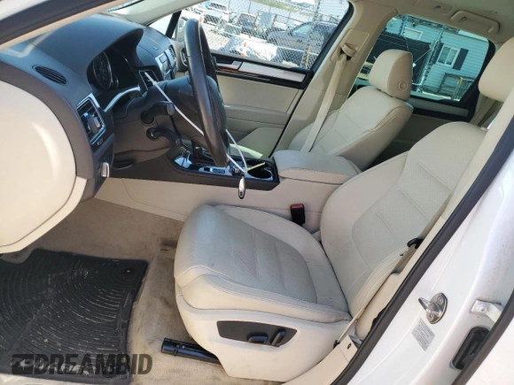 2012 Volkswagen Touareg Sport with VIN WVGEF9BP3CD011165, listed as a Copart auction lot 48913935 with 118,839 mi miles and Salvage Title. Bid and sale history available at DreamBid. Image 7.