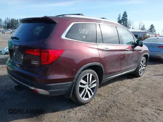 2016 Honda Pilot Touring with VIN 5FNYF6H99GB094933, listed as a IAAI auction lot 41967730 with 98,841 mi miles. Bid and sale history available at carsss.com. Image 4.