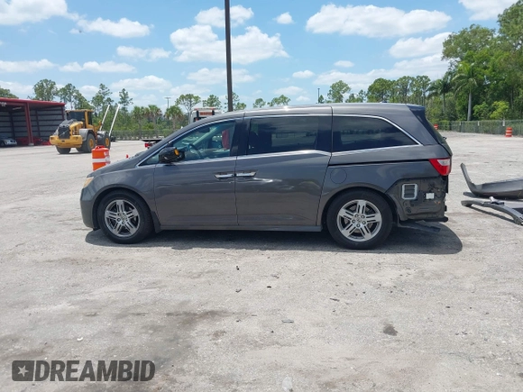 2013 Honda Odyssey Touring with VIN 5FNRL5H96DB068843, listed as a IAAI auction lot 42312176 with 115,804 mi miles and . Bid and sale history available at DreamBid. Image 15.