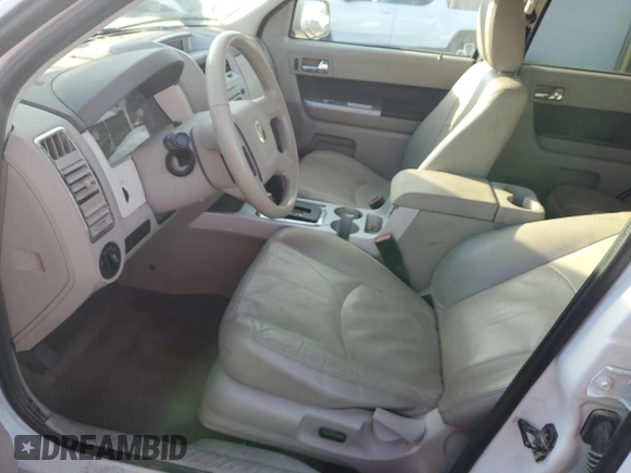 2011 Mercury Mariner Premier with VIN 4M2CN9HG4BKJ07803, listed as a Copart auction lot 46491925 with 135,951 mi miles and Salvage title. Bid and sale history available at DreamBid. Image 7.