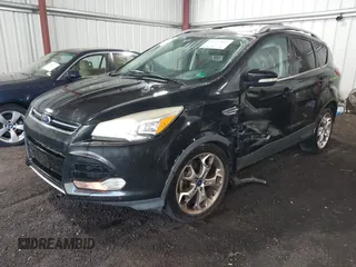 2015 Ford Escape Titanium with VIN 1FMCU9J98FUB00525, listed as a IAAI auction lot 42547989 with 194,040 mi miles and . Bid and sale history available at DreamBid. Image 17.