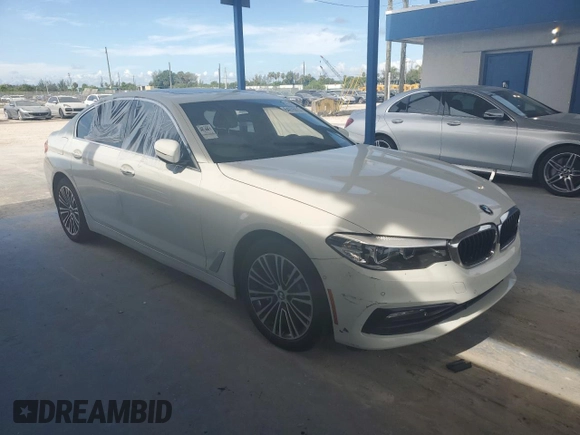 2017 BMW 5 Series 530i with VIN WBAJA5C33HG896475, listed as a Copart auction lot 64276875 with 137,012 mi miles and Clean title. Bid and sale history available at DreamBid. Image 4.