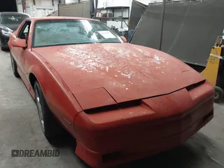 1990 Pontiac Firebird z VIN 1G2FS23T9LL219603, wystawiony jako IAAI lot #41774239 z przebiegiem 135 648 mil mil oraz . Historia ofert i sprzedaży dostępna na DreamBid. Obrazek 6.