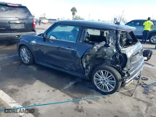 2015 MINI Cooper Hardtop S with VIN WMWXP7C59F2A60317, listed as a IAAI auction lot 41703020 with NaN miles. Bid and sale history available at carsss.com. Image 3.