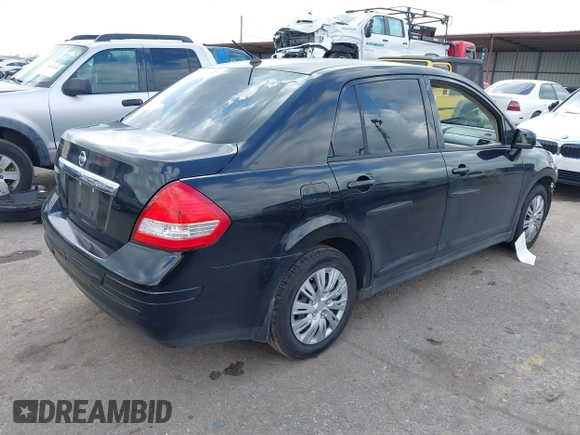 2009 Nissan Versa 1.8 S with VIN 3N1BC11E09L450167, listed as a IAAI auction lot 41711284 with 91,216 mi miles. Bid and sale history available at carsss.com. Image 4.