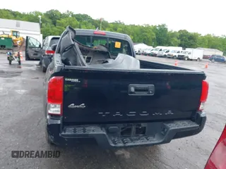 2018 Toyota Tacoma SR with VIN 5TFSX5EN1JX062523, listed as a IAAI auction lot 42334816 with 56,994 mi miles and . Bid and sale history available at DreamBid. Image 16.