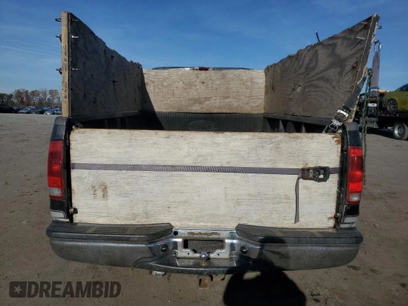 2001 Ford Super Duty F-250 XL with VIN 1FTNW20L11ED23827, listed as a Copart auction lot 82335324 with 223,835 mi miles and Salvage Title. Bid and sale history available at carsss.com. Image 6.