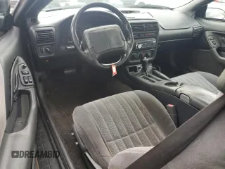 1997 Chevrolet Camaro z VIN 2G1FP22K8V2156852, wystawiony jako Copart lot #51080085 z przebiegiem 163 068 mil mil oraz Szkoda całkowita • Salvage title. Historia ofert i sprzedaży dostępna na DreamBid. Obrazek 8.
