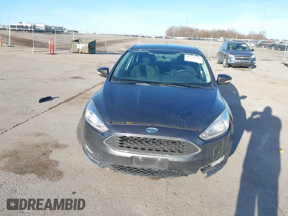2016 Ford Focus SE with VIN 1FADP3F27GL374188, listed as a IAAI auction lot 41738121 with 125,229 mi miles. Bid and sale history available at carsss.com. Image 6.