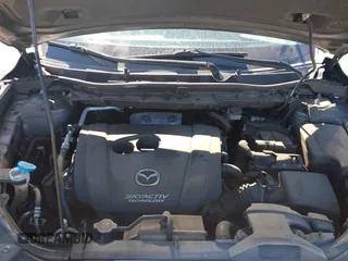 2014 Mazda CX-5 Grand Touring with VIN JM3KE4DY1E0364685, listed as a IAAI auction lot 41665349 with 135,751 mi miles. Bid and sale history available at carsss.com. Image 10.
