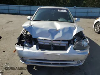 2005 Hyundai Accent GLS with VIN KMHCG35C05U331928, listed as a Copart auction lot 74672614 with 41,542 mi miles and Salvage Title. Bid and sale history available at carsss.com. Image 5.